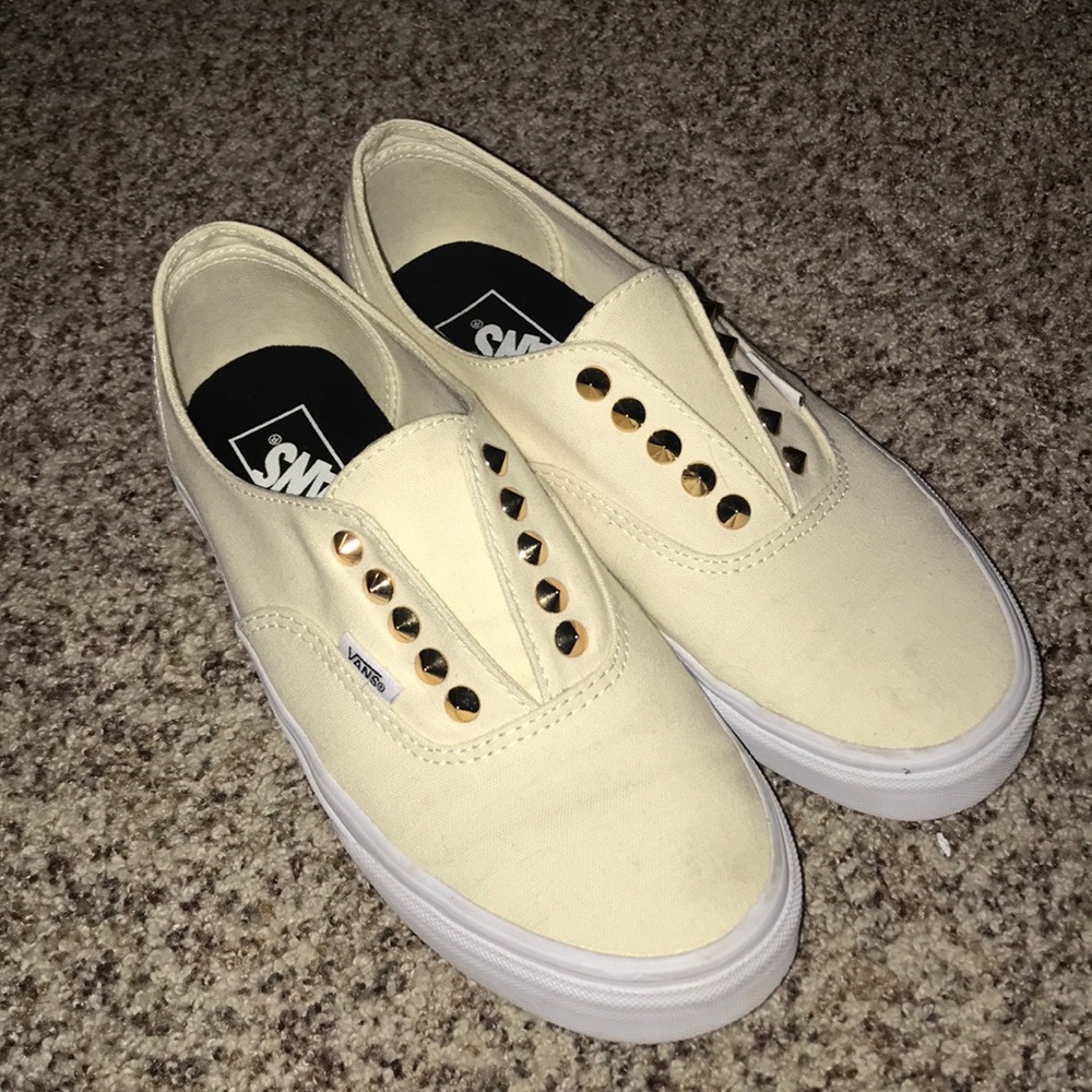 gold and cream studded slip on vans!